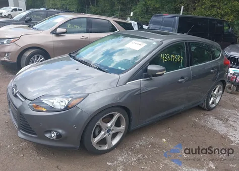 2012 Ford Focus Titanium z USA, uszkodzony, nr VIN 1FAHP3N29CL365618